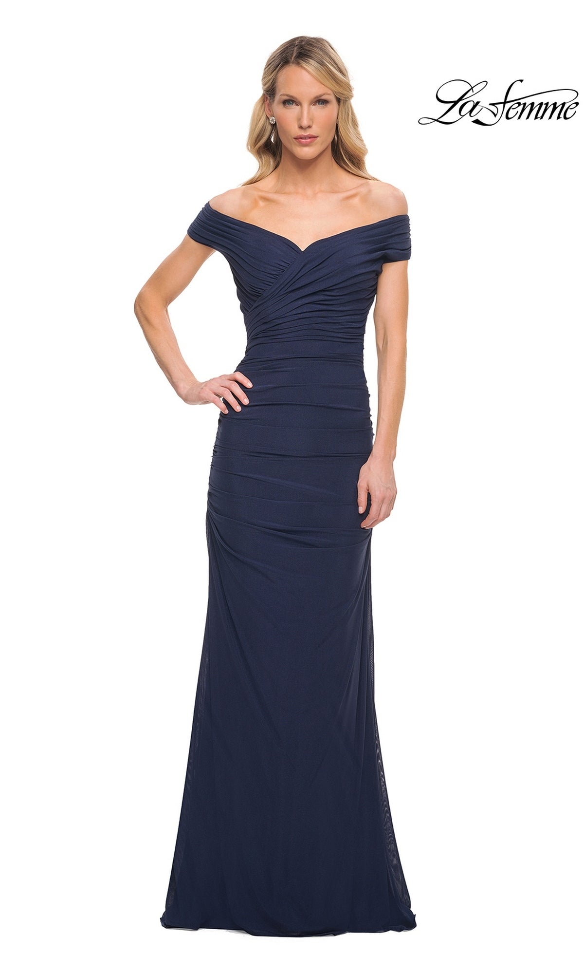 Woman wearing a navy, off-the-shoulder, floor-length La Femme 30363 evening gown with a ruched, gathered bodice.